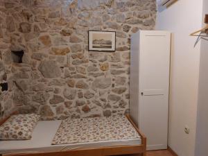 Posteľ alebo postele v izbe v ubytovaní Guesthouse Merla