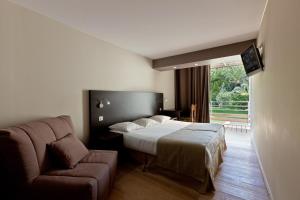 Un ou plusieurs lits dans un hébergement de l'établissement Hotel Club Marina Viva