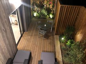 an overhead view of a deck with a table and chairs at La Verda in Bonifacio