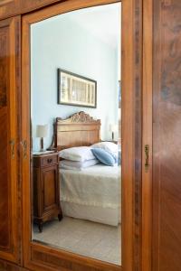 Giường trong phòng chung tại Villa Monacelli B&B