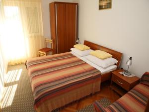 Postel nebo postele na pokoji v ubytování Apartments M&R ŠPADINA