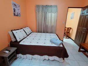 Postel nebo postele na pokoji v ubytování Marta's Guesthouses, apartamentos con entrada autonoma
