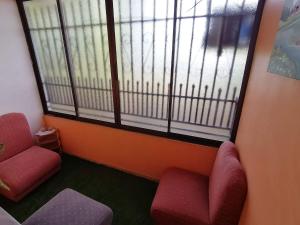 Posezení v ubytování Marta's Guesthouses, apartamentos con entrada autonoma