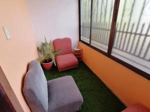 Posezení v ubytování Marta's Guesthouses, apartamentos con entrada autonoma