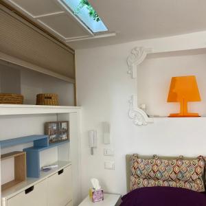 Kuchyňa alebo kuchynka v ubytovaní Silvano Cozy Loft + 17 fotografií