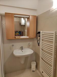 Koupelna v ubytování Doss della Pesa Apartment + 24 fotografií
