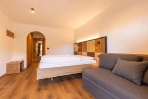 Postel nebo postele na pokoji v ubytování Hotel Piccolo