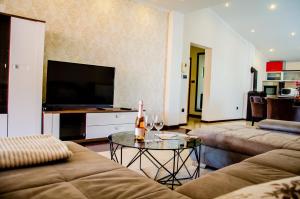Telewizja i/lub zestaw kina domowego w obiekcie Apartments Kraljic
