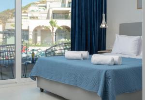 Ένα ή περισσότερα κρεβάτια σε δωμάτιο στο MK Summer Breeze Luxury Apartments