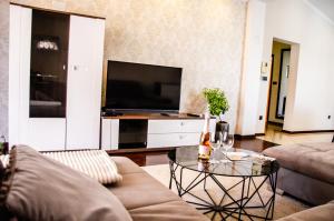 Telewizja i/lub zestaw kina domowego w obiekcie Apartments Kraljic
