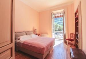 Appartamento Principe tesisinde bir odada yatak veya yataklar