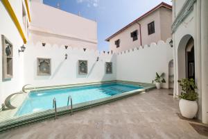 Bassein majutusasutuses Tembo Palace Hotel või selle lähedal