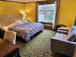 Säng eller sängar i ett rum på Evermore Guesthouse