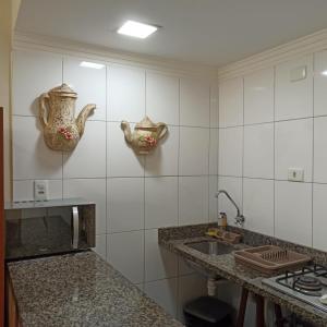 Η κουζίνα ή μικρή κουζίνα στο Apartamento Estúdio na Pitangueiras