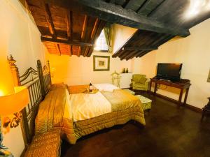 A bed or beds in a room at Piazza Venezia Lulus Home