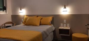 מיטה או מיטות בחדר ב-DU SALABERRY