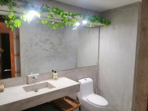 Ванная комната в SAMADHI Resort & Hydrospa Panglao