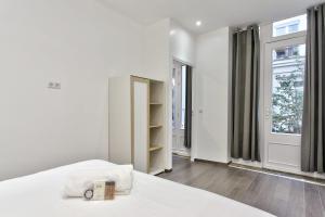Posteľ alebo postele v izbe v ubytovaní Appartement Ricca - Welkeys