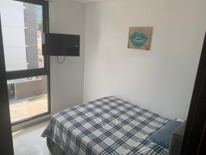 Postel nebo postele na pokoji v ubytování Condominio de lujo