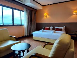 Postel nebo postele na pokoji v ubytování M Hotel Danok