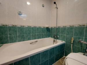 Koupelna v ubytování M Hotel Danok