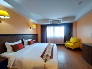 Postel nebo postele na pokoji v ubytování M Hotel Danok