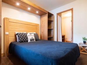 Posteľ alebo postele v izbe v ubytovaní Duplex 3 pièces avec piscine et sauna, hyper centre, Saint-Lary-Soulan - FR-1-296-405