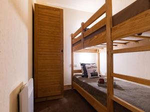 Posteľ alebo postele v izbe v ubytovaní Duplex 3 pièces avec piscine et sauna, hyper centre, Saint-Lary-Soulan - FR-1-296-405