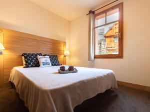 Posteľ alebo postele v izbe v ubytovaní Duplex 3 pièces avec piscine et sauna, hyper centre, Saint-Lary-Soulan - FR-1-296-405