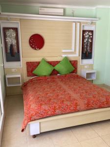 Postel nebo postele na pokoji v ubytování Villa Agung Beach Inn