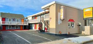 an empty parking lot in front of a motel at Franklin Terrace Motel in Seaside Heights