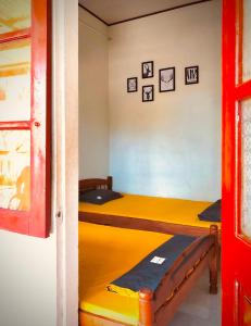 A bed or beds in a room at HOMESTAY LOAN ANH