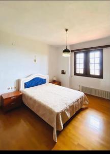 Postel nebo postele na pokoji v ubytování Belinda House