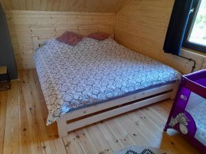 Posteľ alebo postele v izbe v ubytovaní Domek Na Winklu