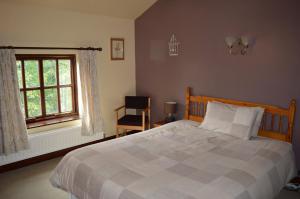 Una cama o camas en una habitación de Hopley House