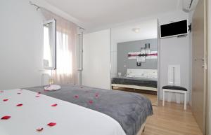 Postel nebo postele na pokoji v ubytování Apartment Moretić + 34 fotografií