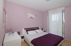 Postel nebo postele na pokoji v ubytování Apartment Moretić