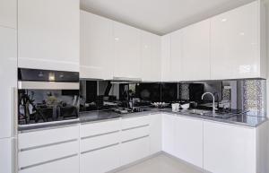 Kuchyň nebo kuchyňský kout v ubytování Apartment Moretić