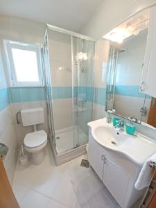 Kúpeľňa v ubytovaní Apartments Amor + 37 fotografií