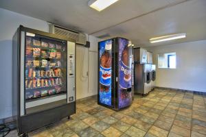 two vending machines in a room with drinks at Motel 6-Douglas, AZ in Douglas