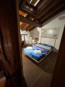 Posteľ alebo postele v izbe v ubytovaní LA TUA CASA IN VALPOLICELLA