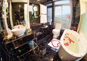 Ванна кімната в Palmier Hotel - Art House Da Nang