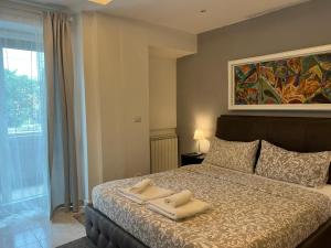 Posteľ alebo postele v izbe v ubytovaní Appia Avenue 639