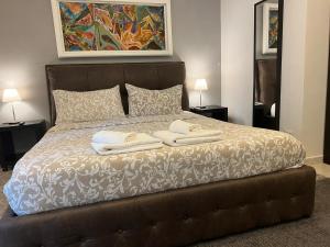 Posteľ alebo postele v izbe v ubytovaní Appia Avenue 639