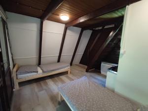 Posteľ alebo postele v izbe v ubytovaní Mátrai Vándor Apartmanok