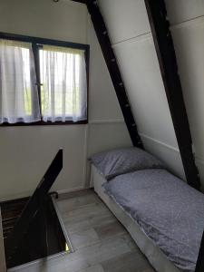 Posteľ alebo postele v izbe v ubytovaní Mátrai Vándor Apartmanok