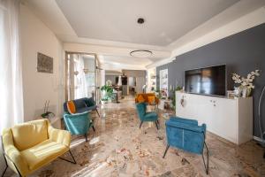 TV a/nebo společenská místnost v ubytování Hotel Menapace