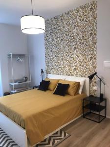 Postel nebo postele na pokoji v ubytování Rooms La Spezia 5 Terre