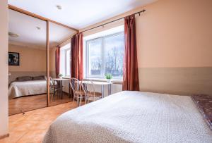 Postel nebo postele na pokoji v ubytování Mara + 5 fotografií