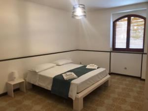 Posteľ alebo postele v izbe v ubytovaní Stella d'Aurora waterview